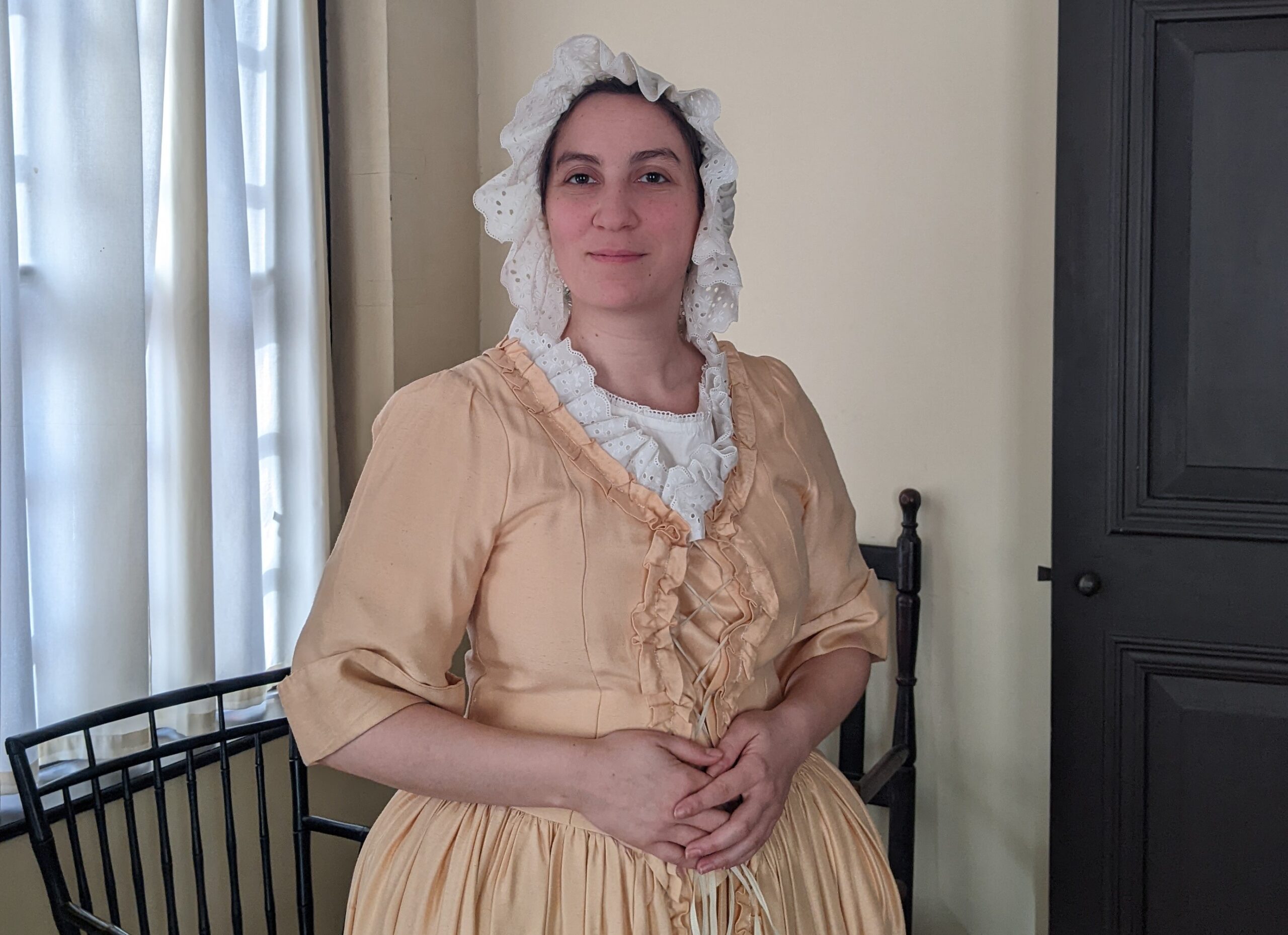 Mehitabel Glenhaber in colonial dress as Hannah Mather